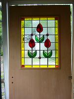  puerta con vitraux motivo tulipanes y gemas.-
cod:168