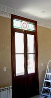  vitraux con iniciales en panel superior de la puerta.-
cod:155