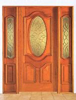 puerta con vitral de bronce y vidrios biselados en sanwich de vidrios templados.-
cod:131